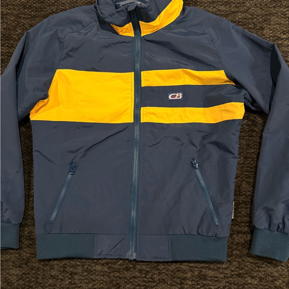 Cutter & Buck Navy and Yellow Windbreaker woman’s golf